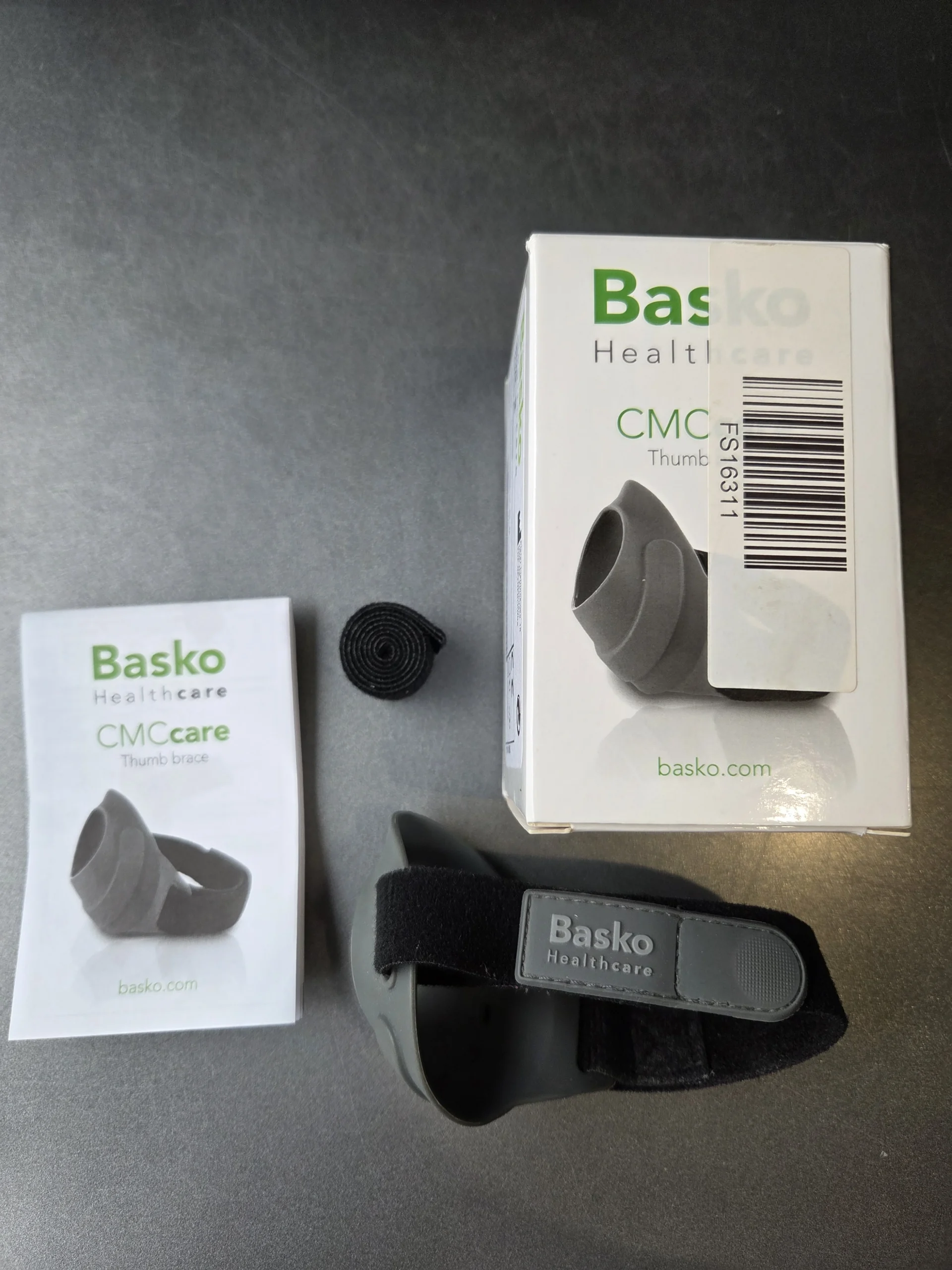 Basko duimbrace CMC unboxing met doos, handleiding en brace, getest door fysioengezond.nl