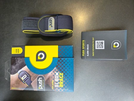 Push Sports elleboogbrace unboxing met doos, brace en handleiding, getest door fysioengezond.nl